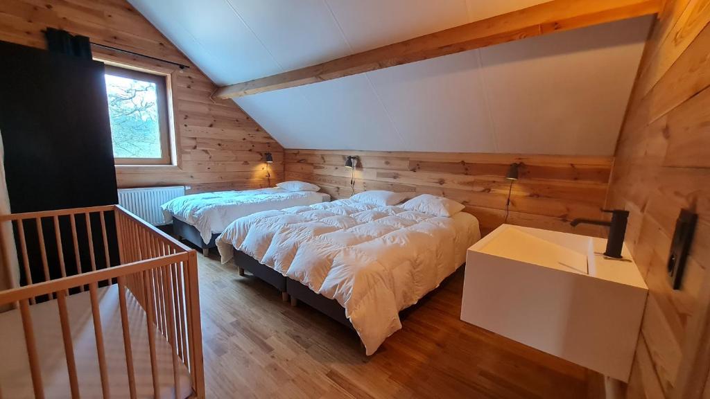 Postel nebo postele na pokoji v ubytování Eduard - Gîte Ardennais