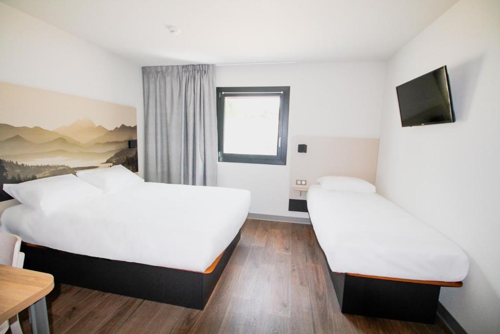 Posteľ alebo postele v izbe v ubytovaní B&B HOTEL Aix-les-Bains
