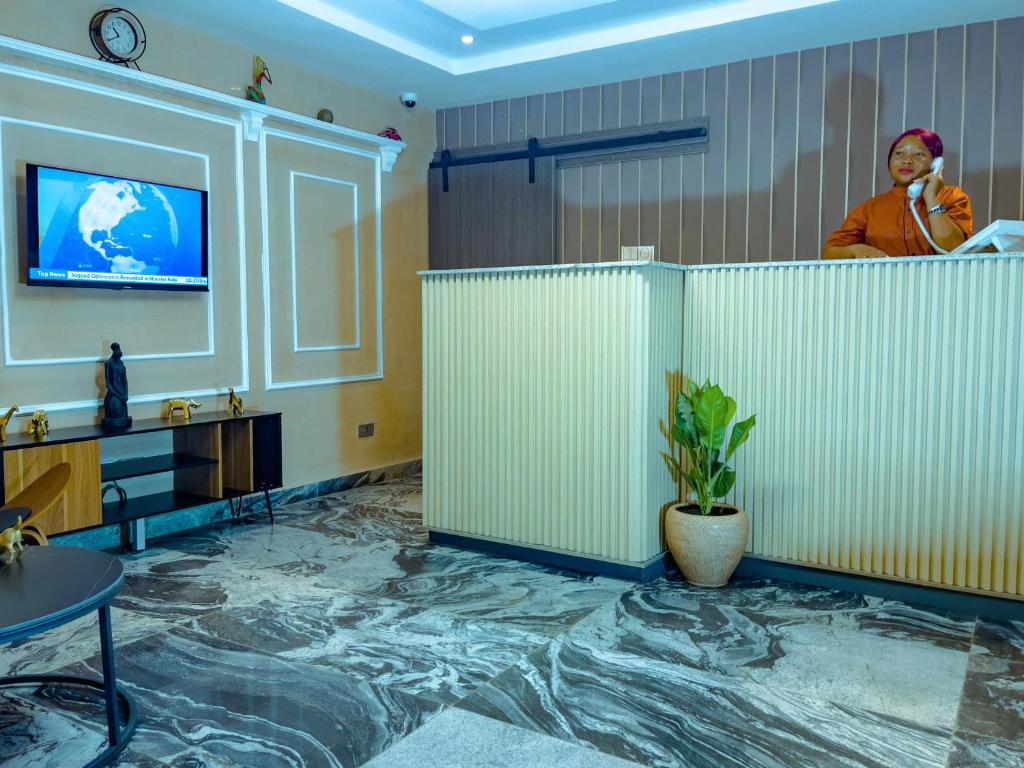 TV a/nebo společenská místnost v ubytování 154 Apartments and Hotel