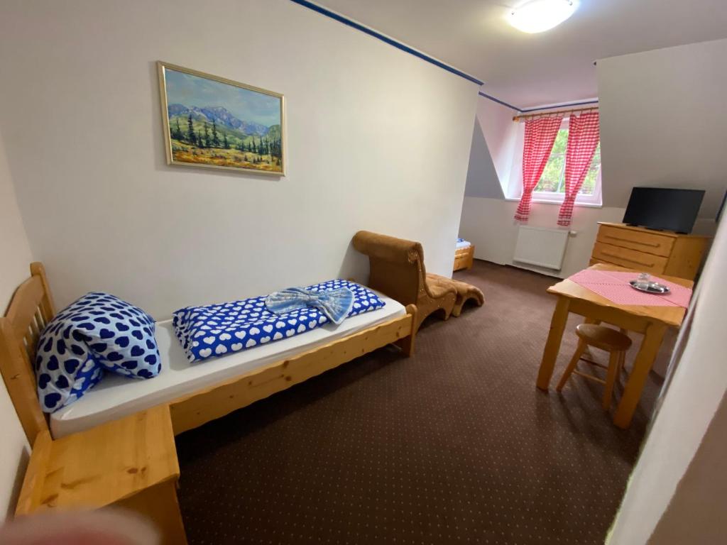 Postel nebo postele na pokoji v ubytování Pension Aja