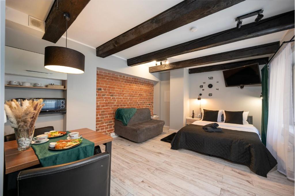 Posedenie v ubytovaní Kościelna Loft Apartaments