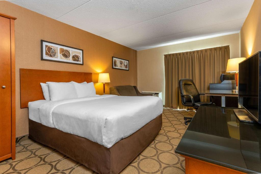 Postel nebo postele na pokoji v ubytování Comfort Inn