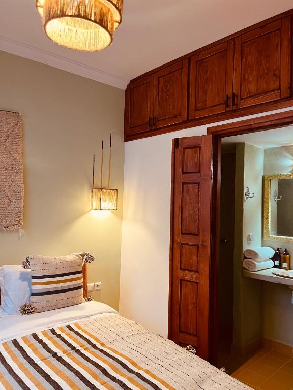 Postel nebo postele na pokoji v ubytování hostel riad maqam