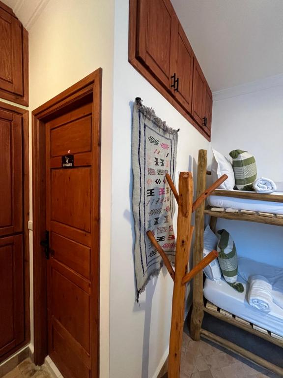 Postel nebo postele na pokoji v ubytování hostel riad maqam