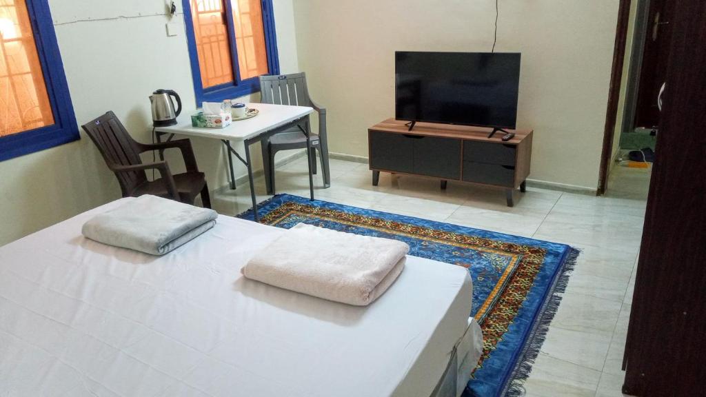 TV a/nebo společenská místnost v ubytování SALEM House Hostel Nizwa