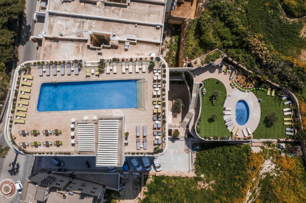 Bazén v ubytování Reef Hotel & Spa nebo v jeho okolí
