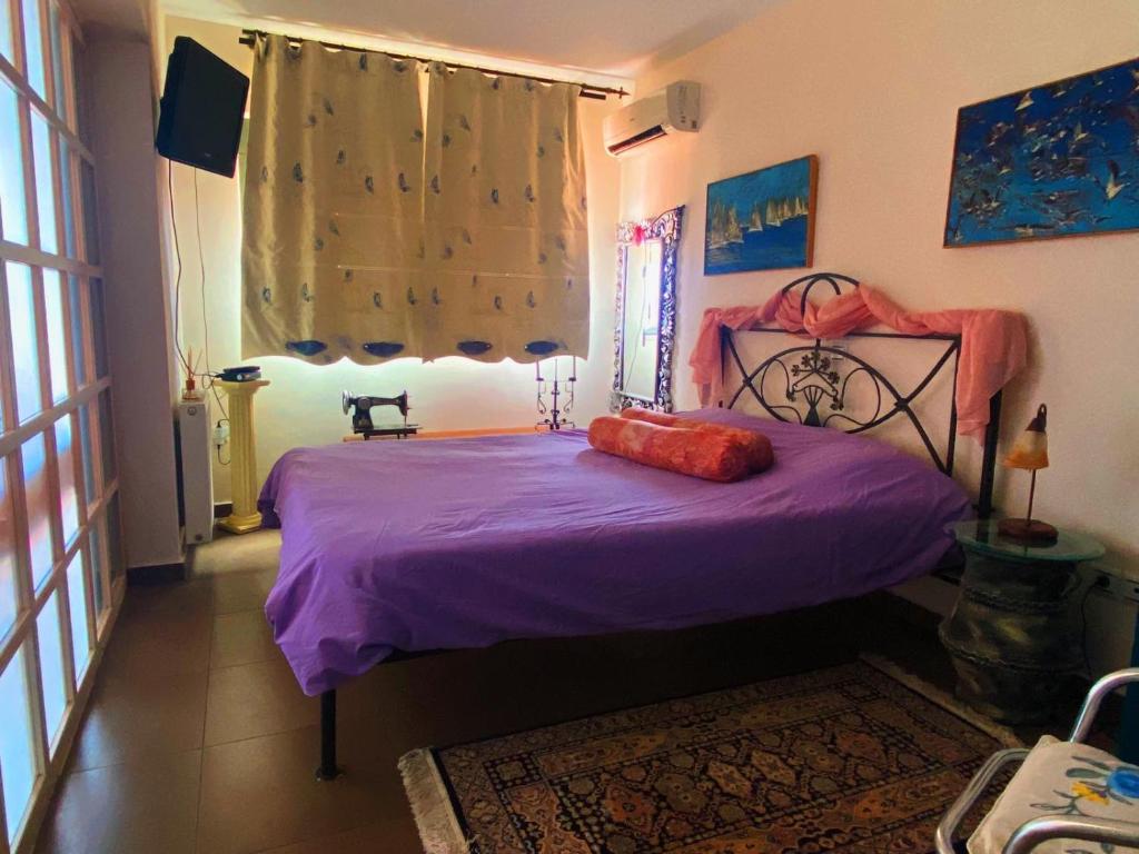 Postel nebo postele na pokoji v ubytování horizon villa