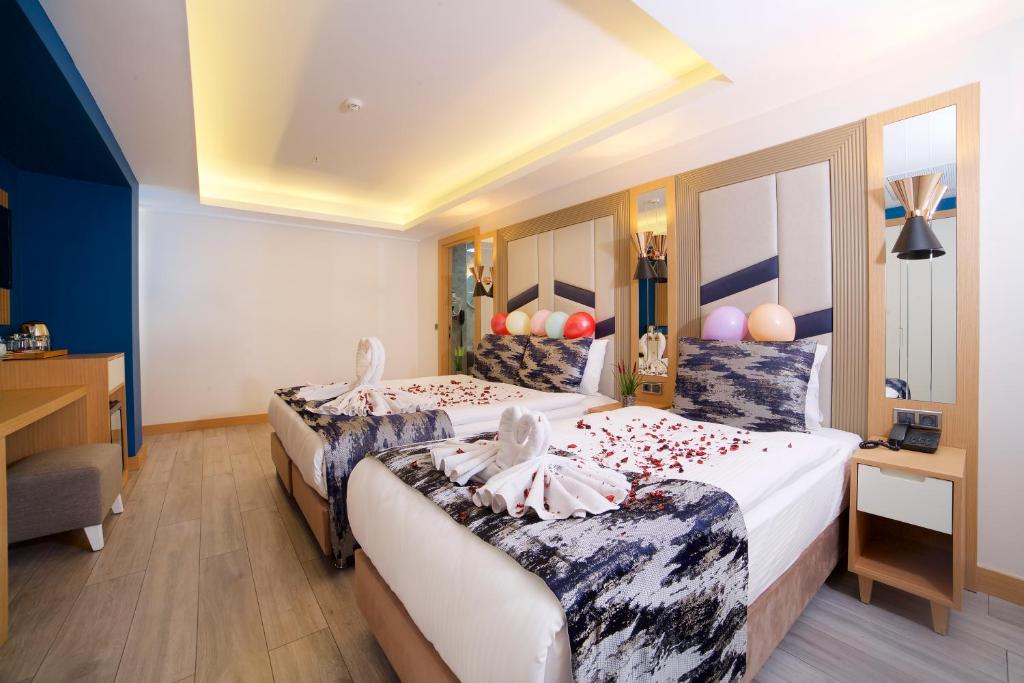 Letto o letti in una camera di Downtown Sirkeci Hotel