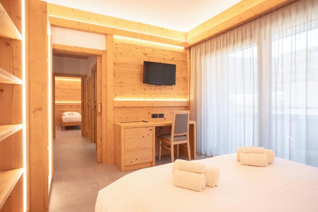 Postel nebo postele na pokoji v ubytování Hotel Angelo