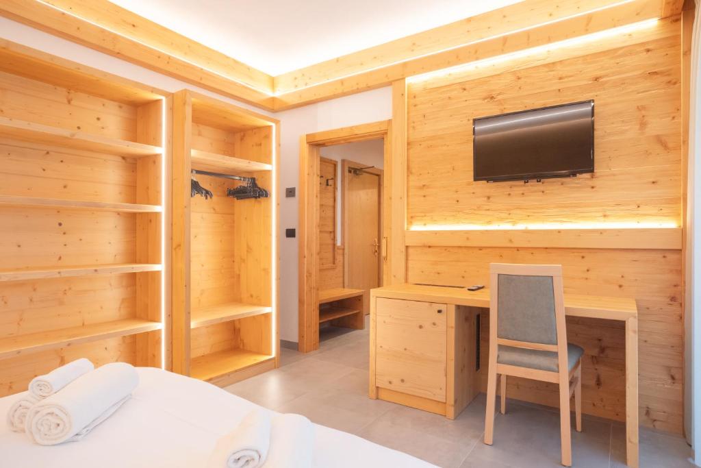 Postel nebo postele na pokoji v ubytování Hotel Angelo