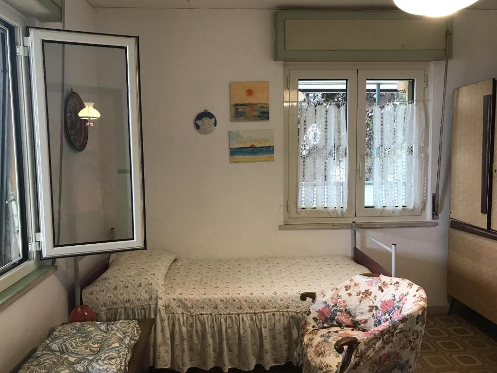 A bed or beds in a room at Casa Patrizia