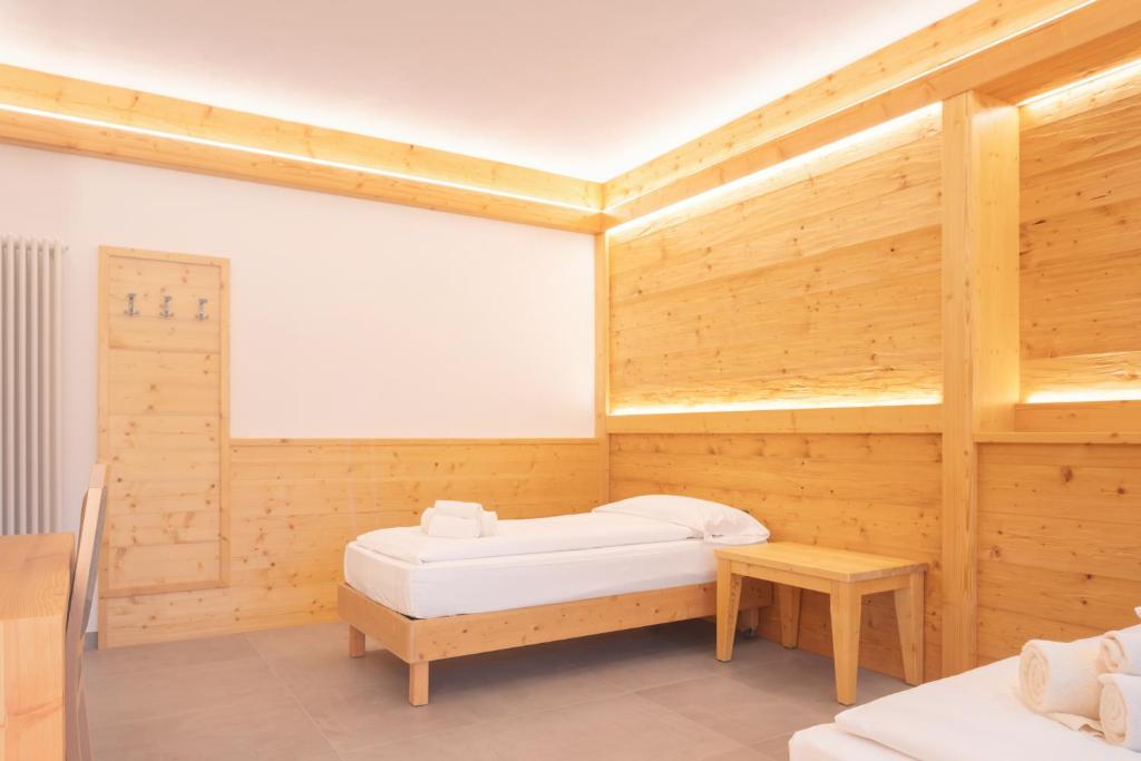 Postel nebo postele na pokoji v ubytování Hotel Angelo