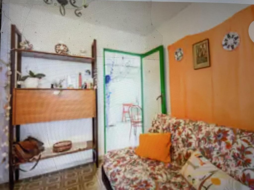 A bed or beds in a room at Casa Patrizia