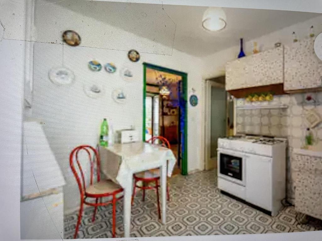 A kitchen or kitchenette at Casa Patrizia