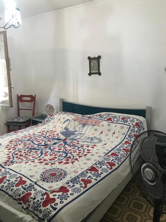 A bed or beds in a room at Casa Patrizia