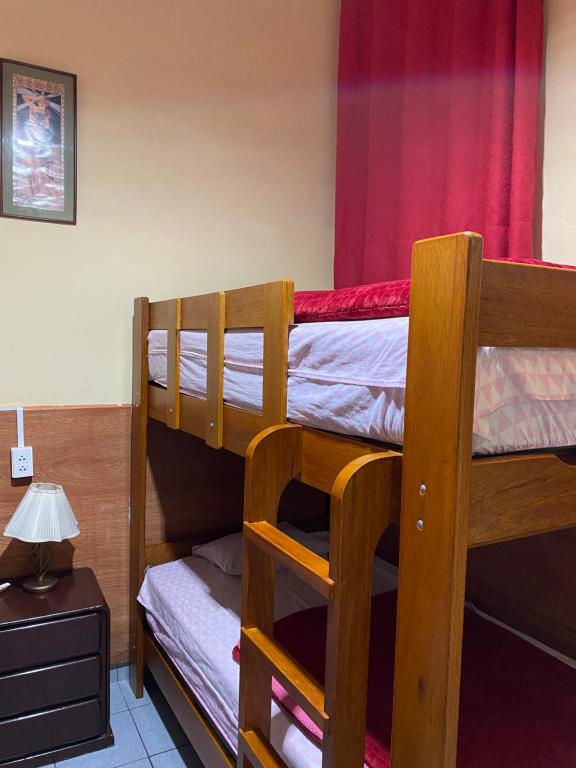Postel nebo postele na pokoji v ubytování KORICANCHA