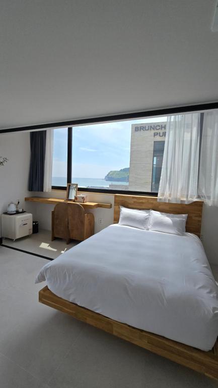 Postel nebo postele na pokoji v ubytování Hygge Hotel