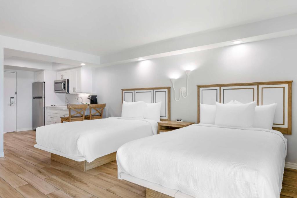 Ein Bett oder Betten in einem Zimmer der Unterkunft Best Western Plus Beach Resort