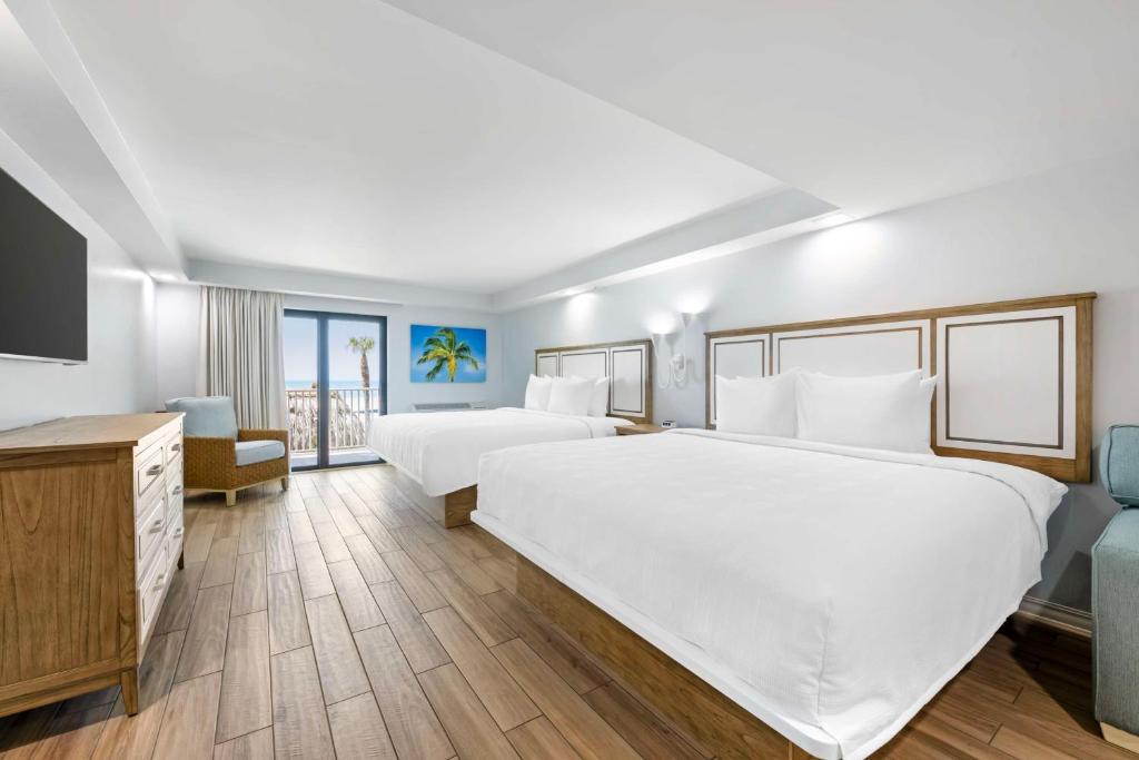 Ein Bett oder Betten in einem Zimmer der Unterkunft Best Western Plus Beach Resort