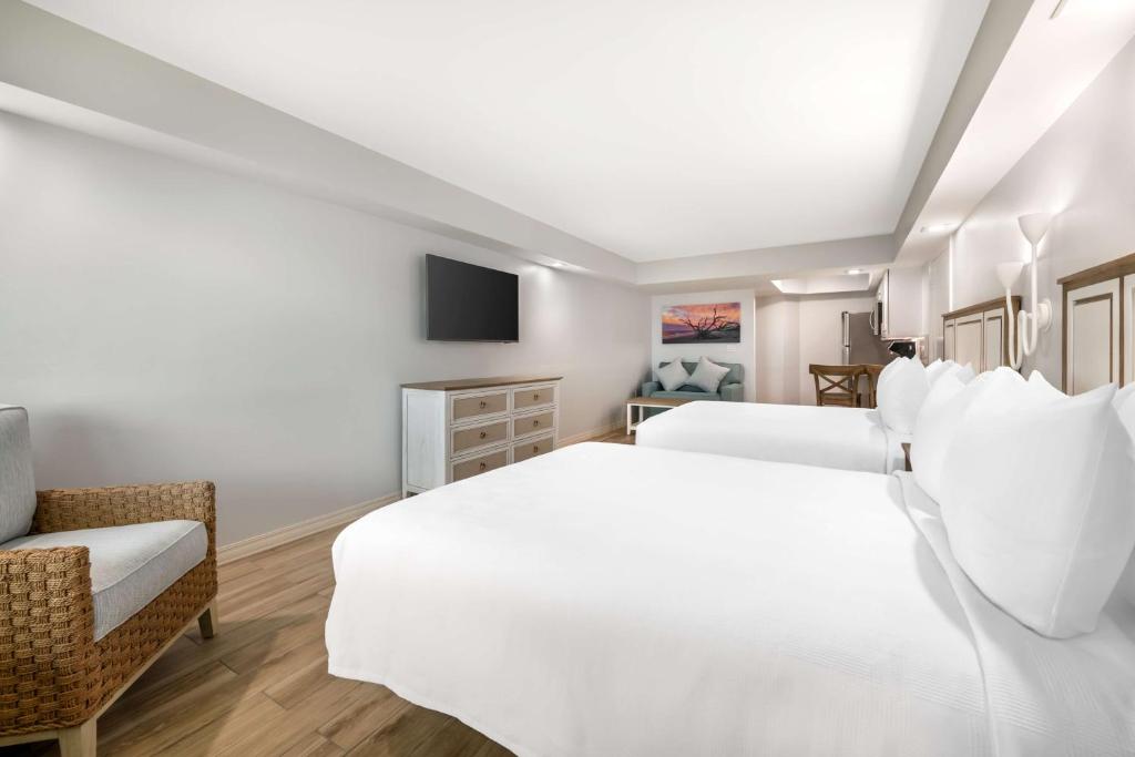 Ein Bett oder Betten in einem Zimmer der Unterkunft Best Western Plus Beach Resort