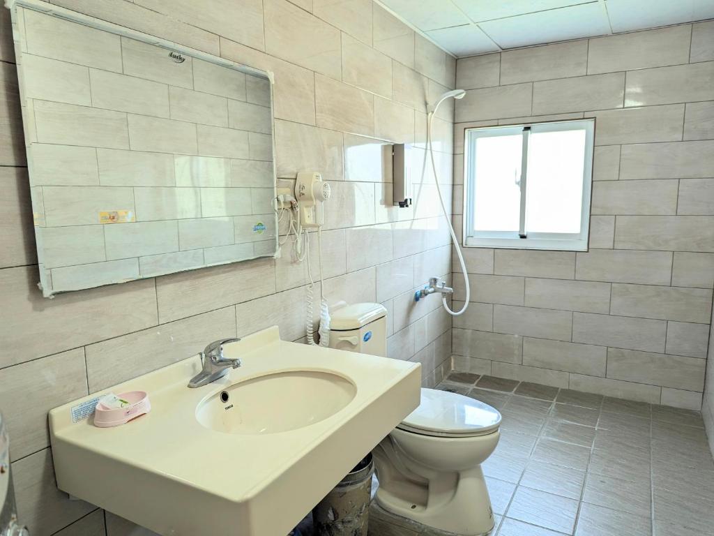 Koupelna v ubytování A-Lang Homestay