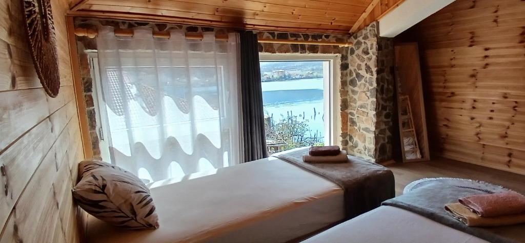 Postel nebo postele na pokoji v ubytování Nesti Relax Home