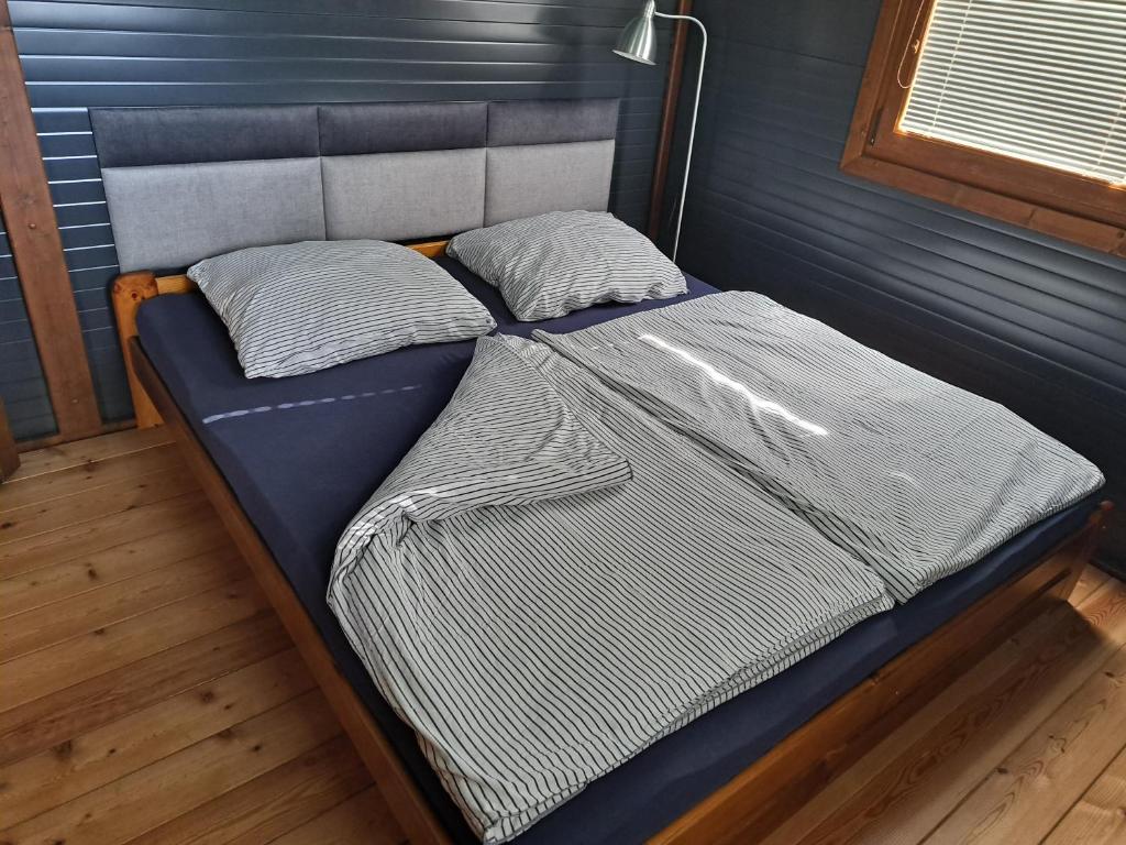 Postel nebo postele na pokoji v ubytování Chata Seč
