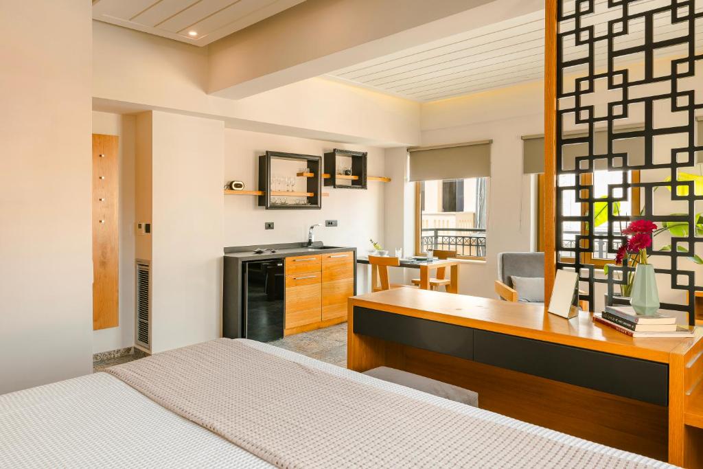 Kuchyň nebo kuchyňský kout v ubytování Querini Luxury Suites