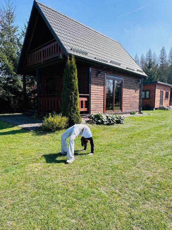 Vonkajšia záhrada v ubytovaní Domki nad Szelągiem
