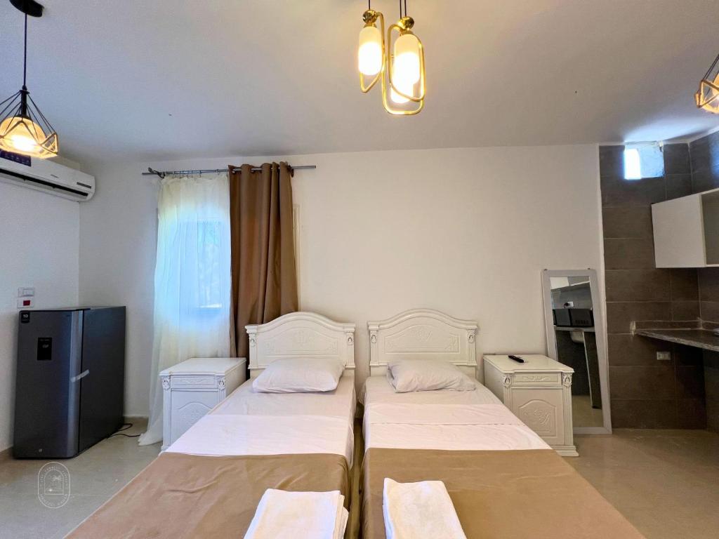 Postel nebo postele na pokoji v ubytování Manzzel Dahab Hostel
