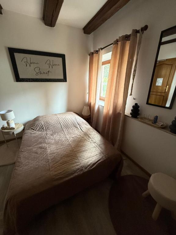 Postel nebo postele na pokoji v ubytování Hotel Wistub Le PasSage