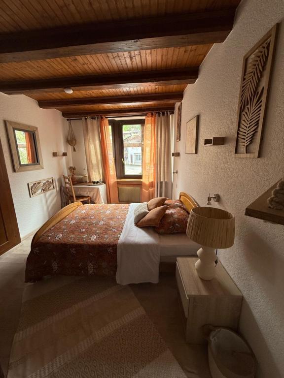 Postel nebo postele na pokoji v ubytování Hotel Wistub Le PasSage