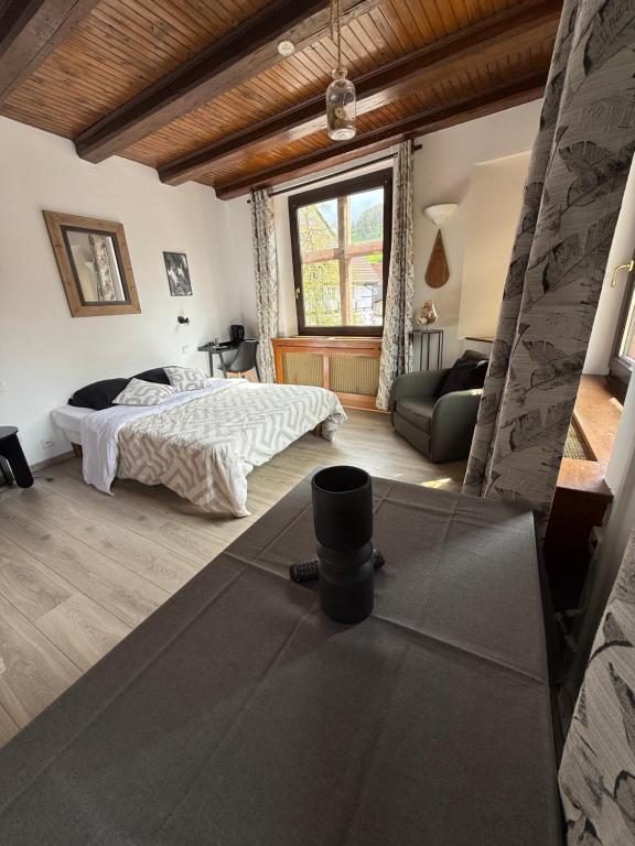 Postel nebo postele na pokoji v ubytování Hotel Wistub Le PasSage