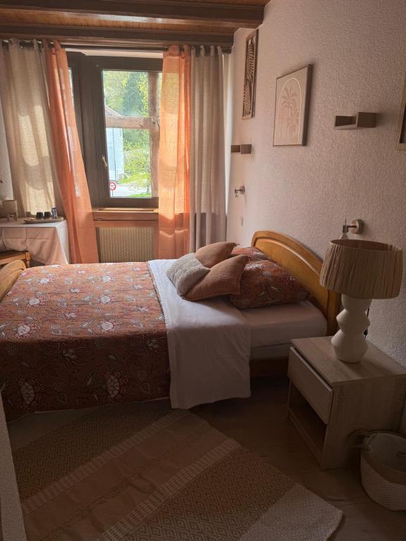 Postel nebo postele na pokoji v ubytování Hotel Wistub Le PasSage