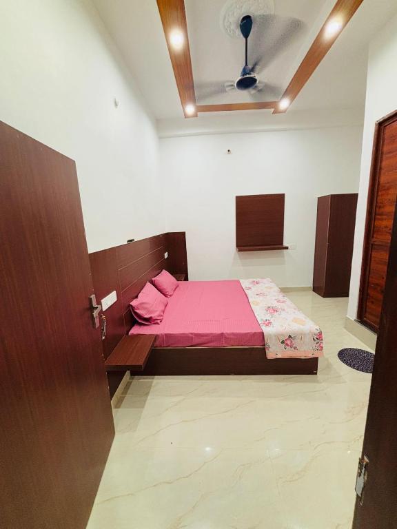 Katil atau katil-katil dalam bilik di Ahem Palace Home Stay
