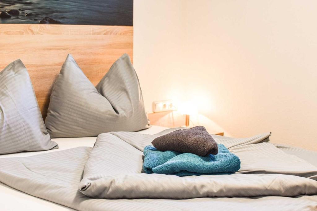 Posteľ alebo postele v izbe v ubytovaní Appartements Schwarzer Adler