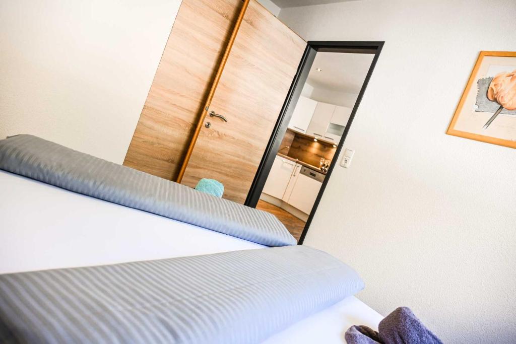 Posteľ alebo postele v izbe v ubytovaní Appartements Schwarzer Adler