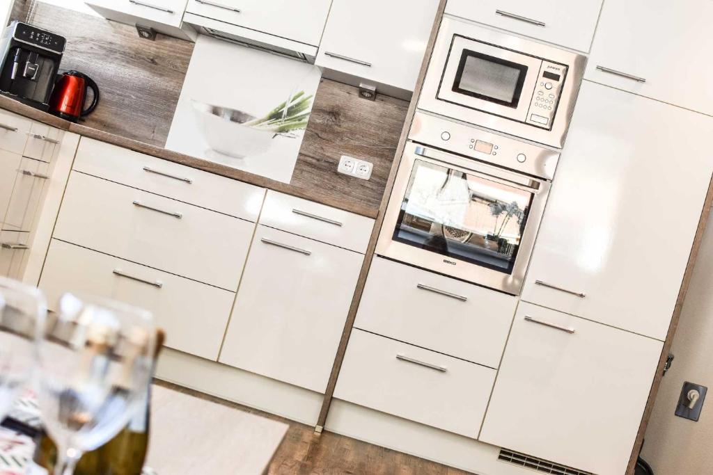 Kuchyňa alebo kuchynka v ubytovaní Appartements Schwarzer Adler