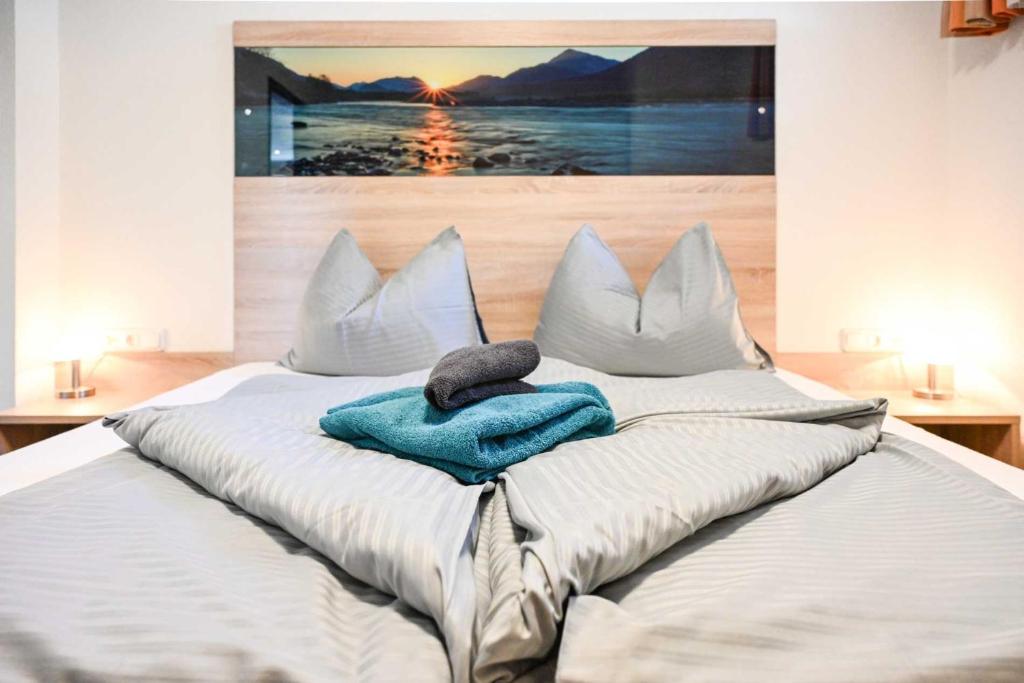 Posteľ alebo postele v izbe v ubytovaní Appartements Schwarzer Adler
