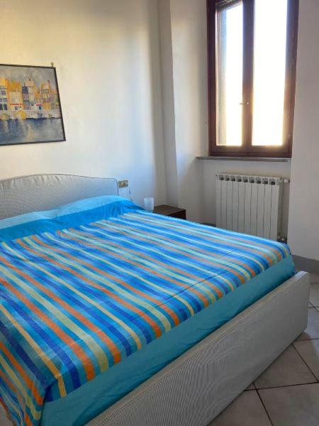 Postel nebo postele na pokoji v ubytování Appartamento Porticciolo
