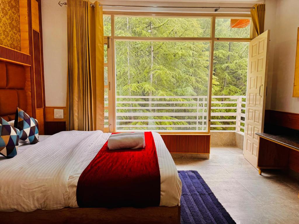 Ένα ή περισσότερα κρεβάτια σε δωμάτιο στο Hotel White Regency -300 MTR from Golden Temple