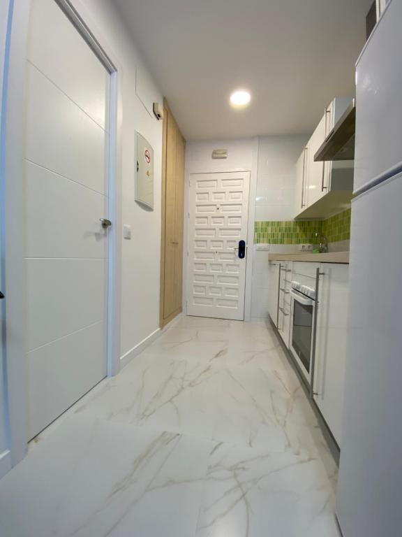 Kuchyň nebo kuchyňský kout v ubytování BENALBEACH LOFT Encatador
