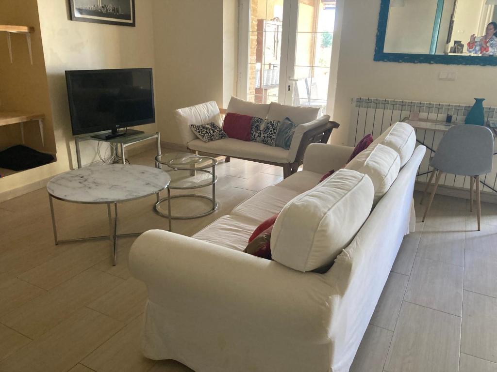 TV a/nebo společenská místnost v ubytování El encanto de un pueblo