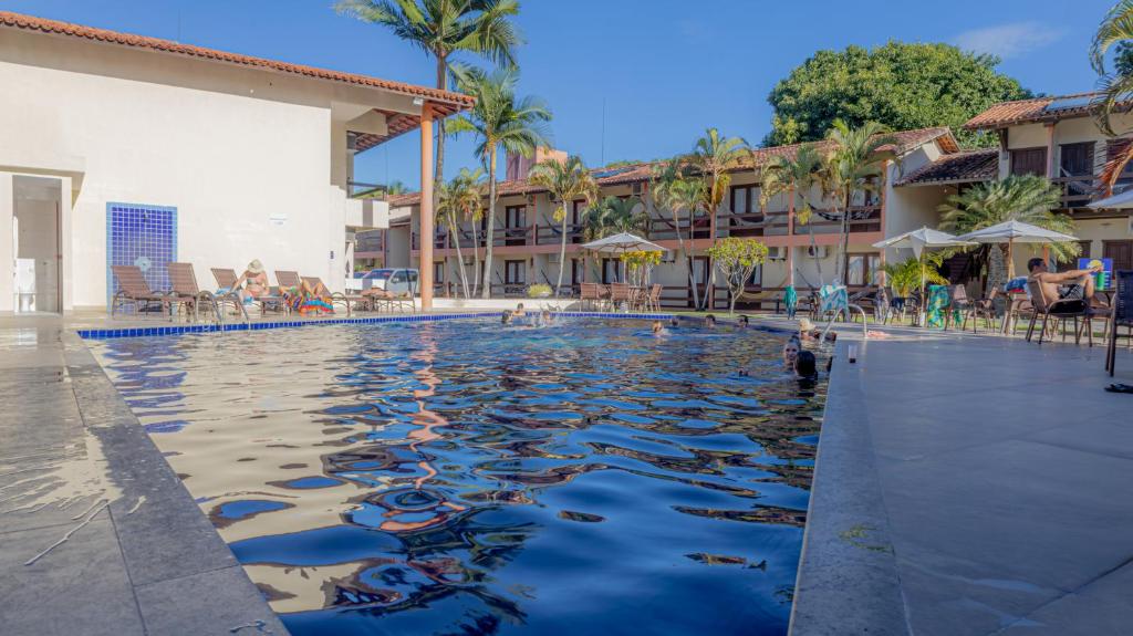 Bazén v ubytování Hotel Fênix nebo v jeho okolí