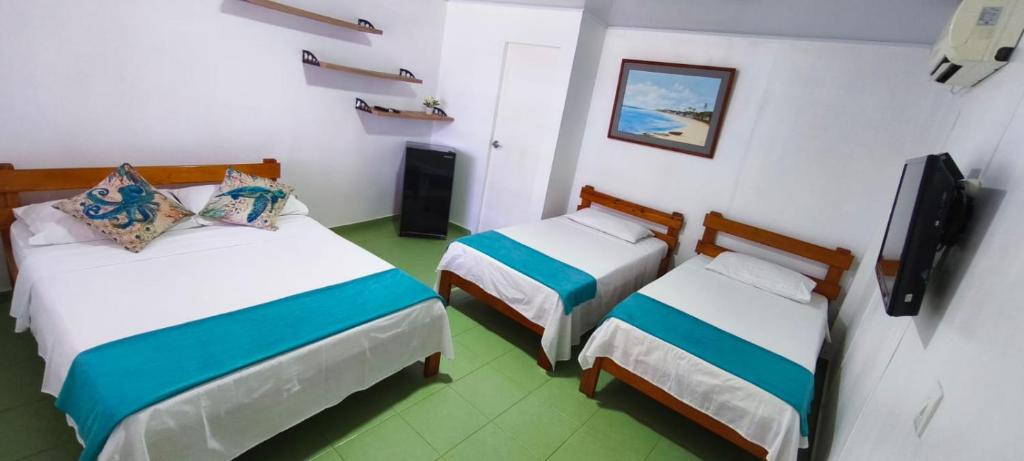 Letto o letti in una camera di Sarie Bay Inn