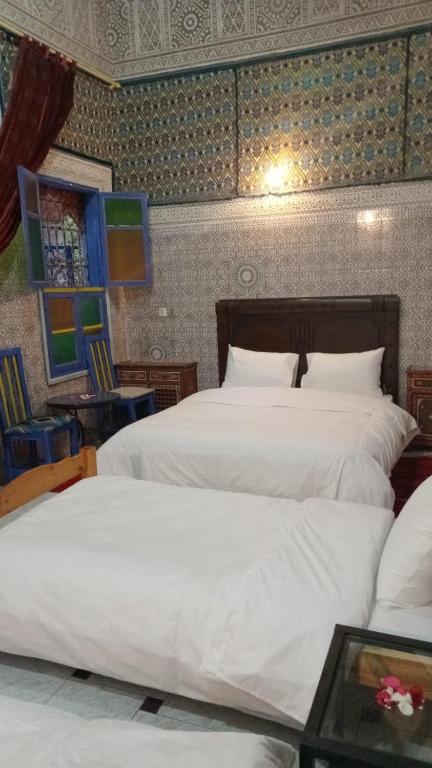Postel nebo postele na pokoji v ubytování Riad Carole - Perfect for Families & Groups