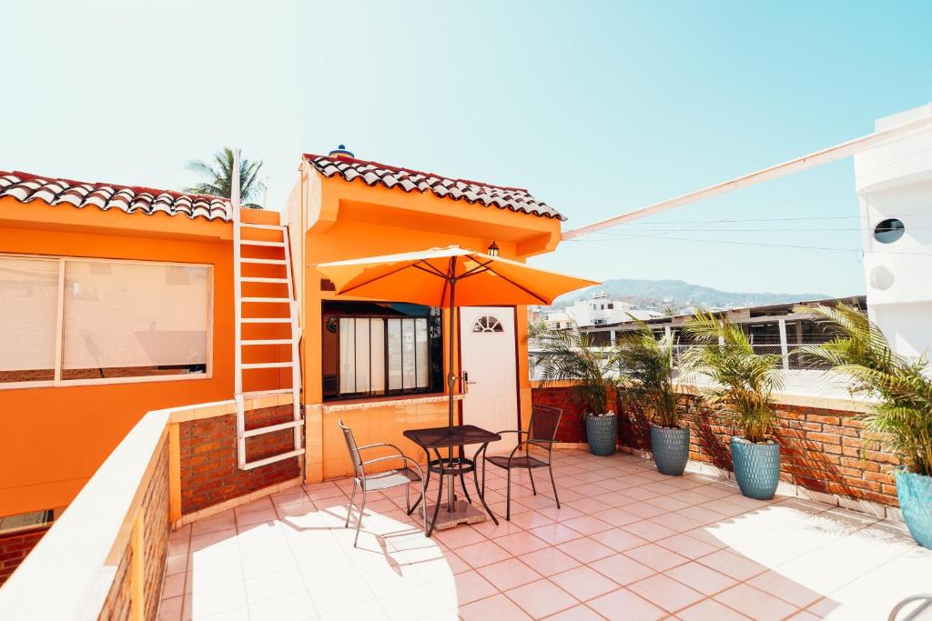 Balkón nebo terasa v ubytování Boutique Hotel & Suites Hacienda Lord Twigg