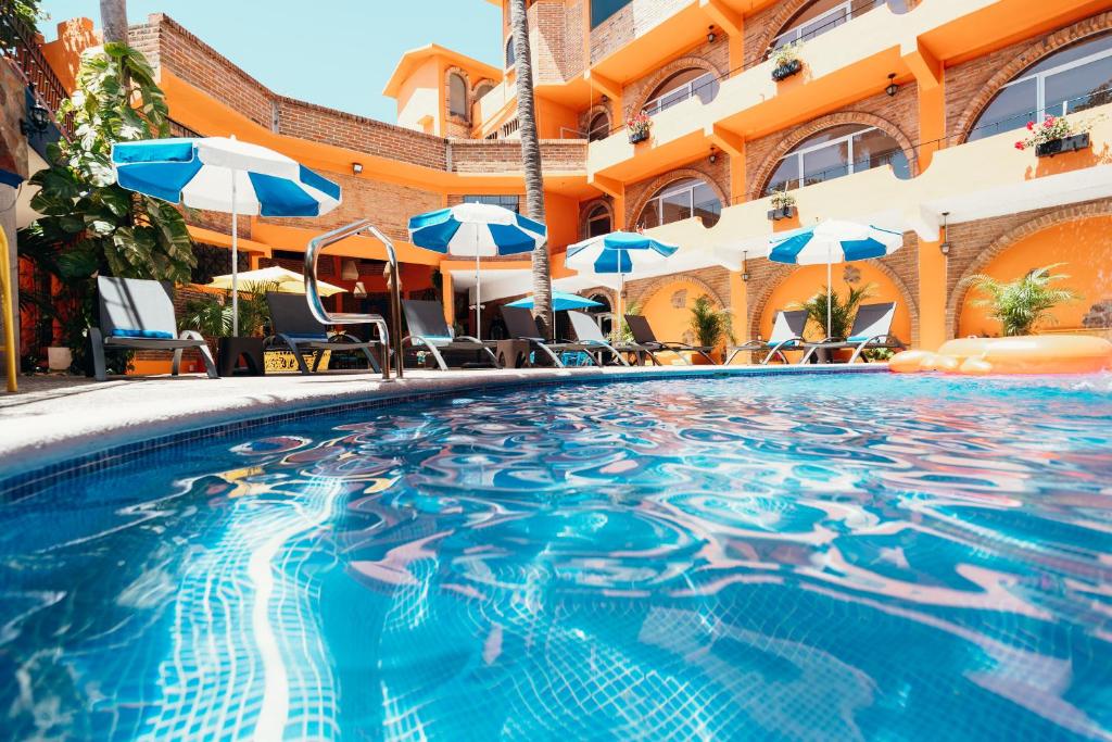Bazén v ubytování Boutique Hotel & Suites Hacienda Lord Twigg nebo v jeho okolí