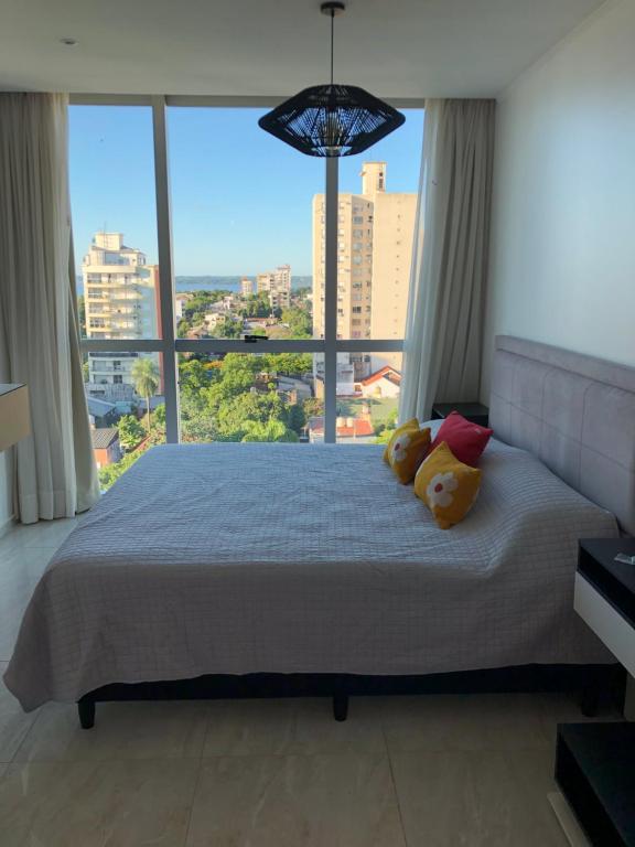 En eller flere senge i et værelse på charlotte belgrano suite