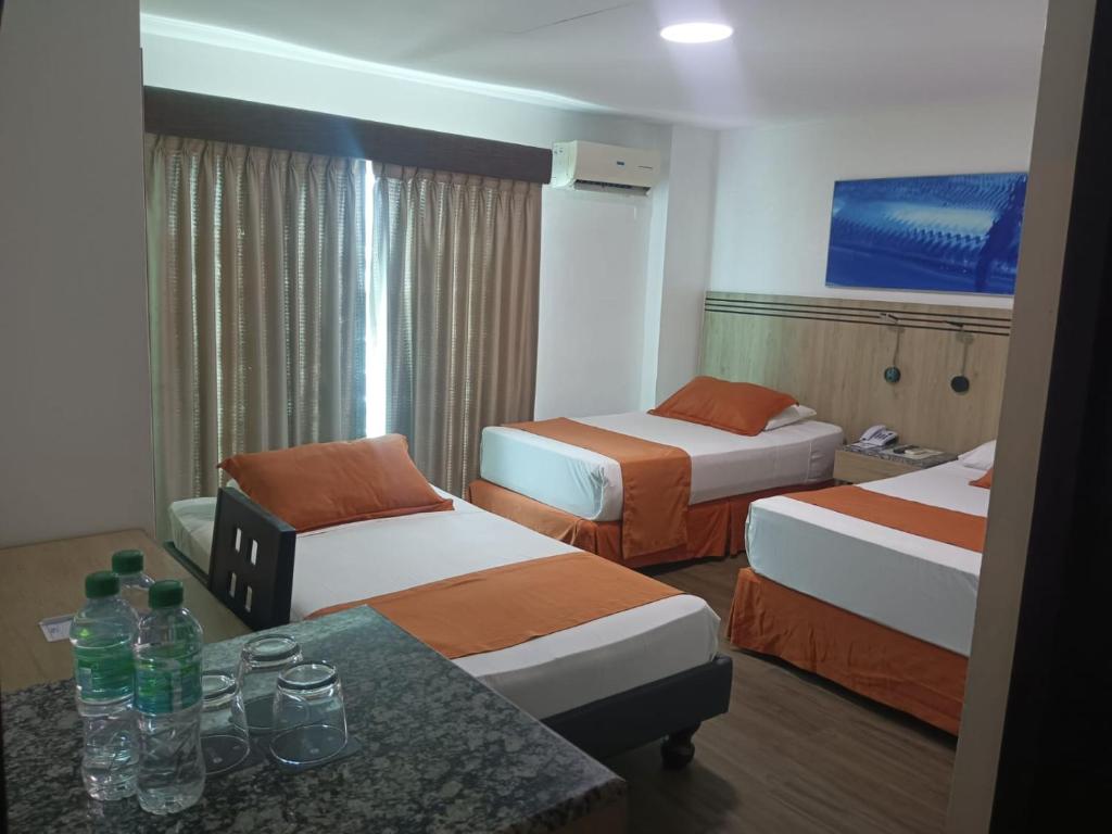 Postel nebo postele na pokoji v ubytování Hotel Mar Azul